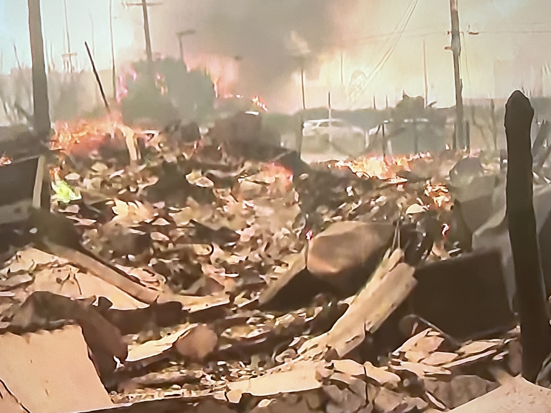 The wildfires forced at least 21 school districts to cancel classes for Wednesday, and an assisted living center has been destroyed.