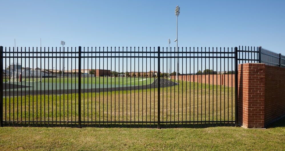 The campus perimeter can often be the first barrier an intruder encounters. School administrators can use fences to bolster baseline security. perimeter fencing, Crime Prevention Through Environmental Design, CPTED, access control, visitor monitoring, Partner Alliance for Safer Schools (PASS), school safety, Eric Kell, Fortress Building Products