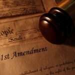 Larry Bushart Jr.’s month-long imprisonment over his social media post about Charlie Kirk’s assassination highlights the clash between Tennessee’s school safety laws and First Amendment rights. Perry County Sheriff’s Office, Perry County School System, free speech, threat assessment,