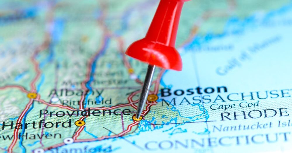 Providence private schools have temporarily closed and area universities have implemented heightened security measures as the suspect in the fatal Brown University shooting remains at large.